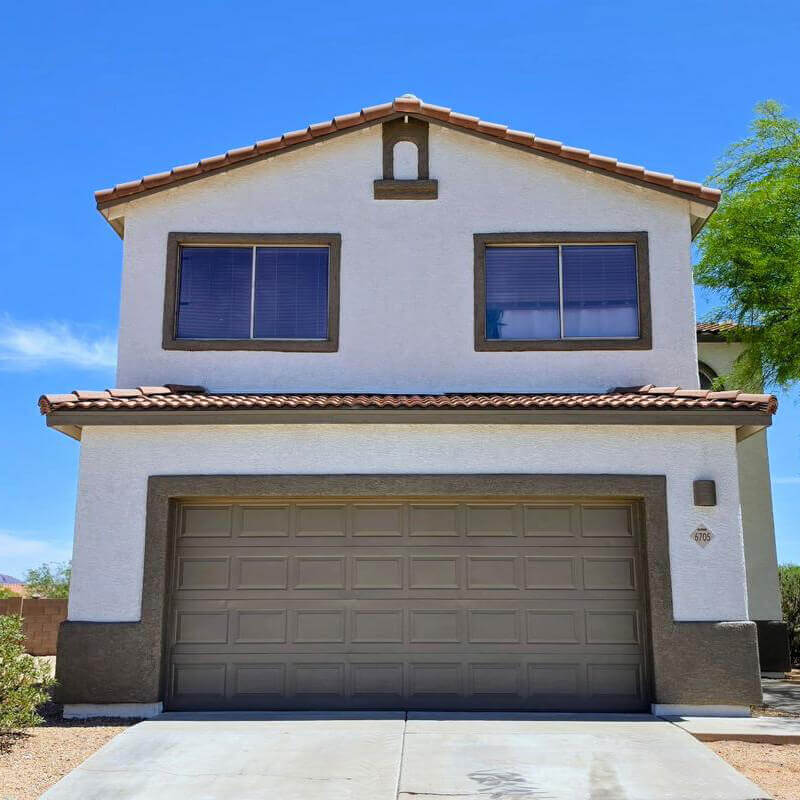 Same home after fresh modern stucco restoration