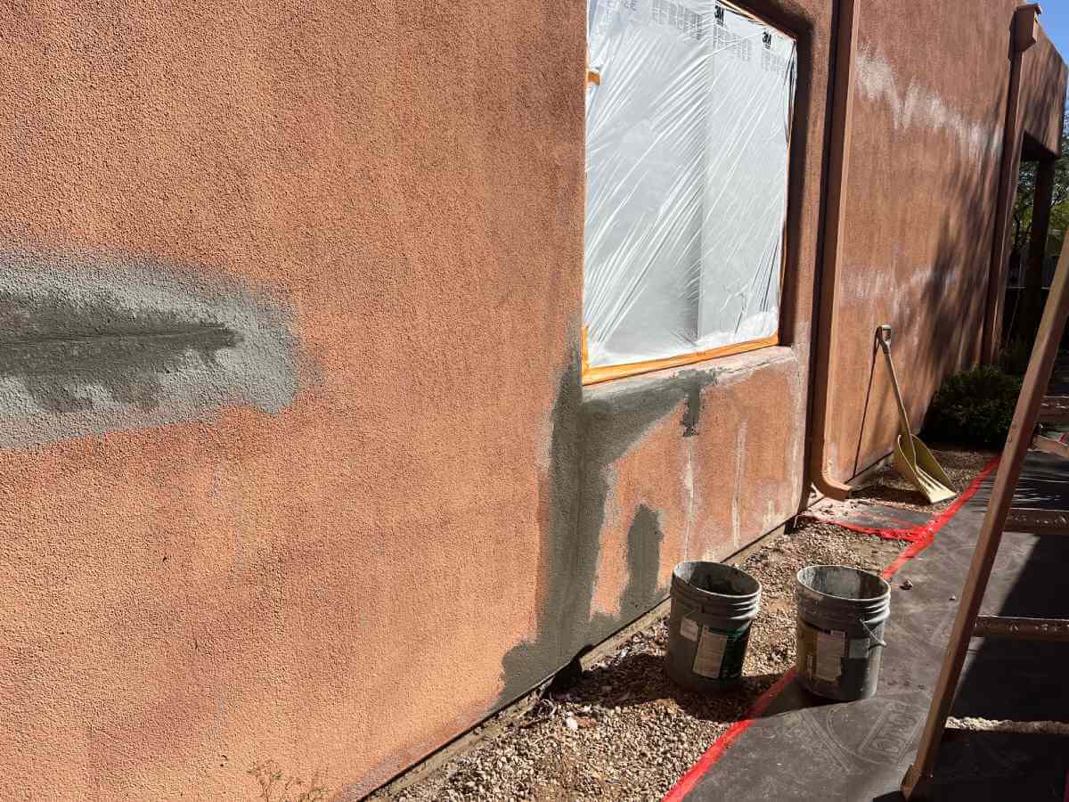 Sunset Coatings crew repairing exterior stucco in Tucson